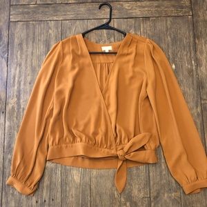 Hem & Thread Burnt Orange Blouse with a V-neckline & side tie with a bow Size M